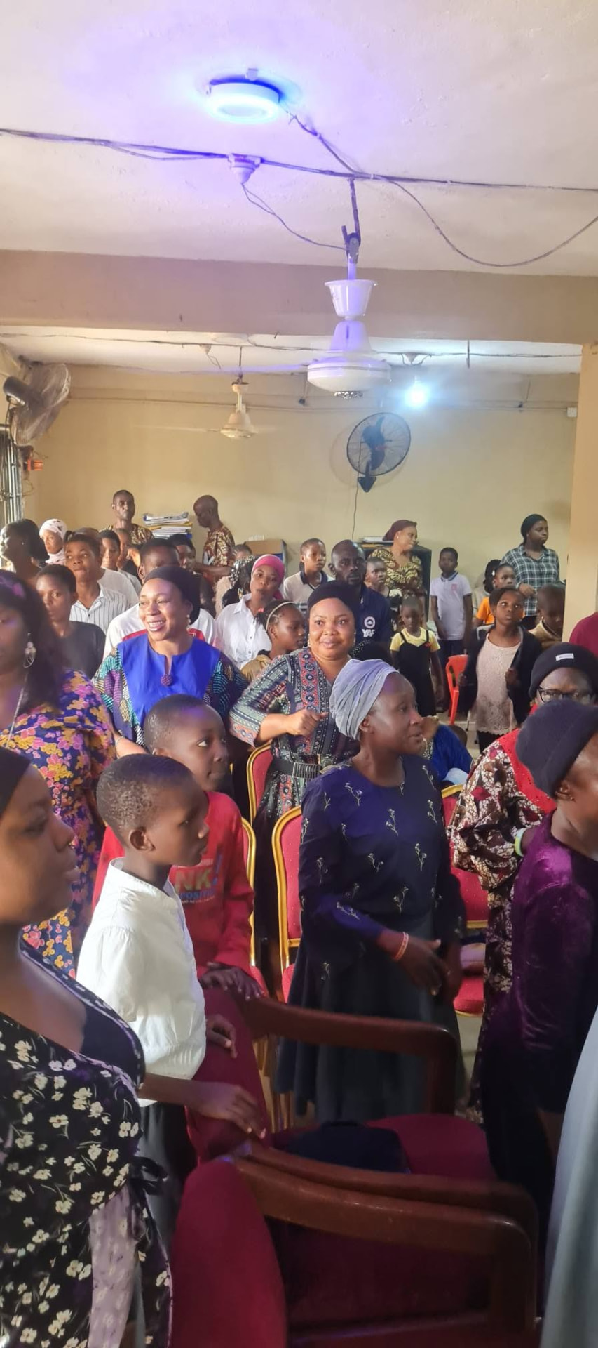 Congregation standing in praise during service
